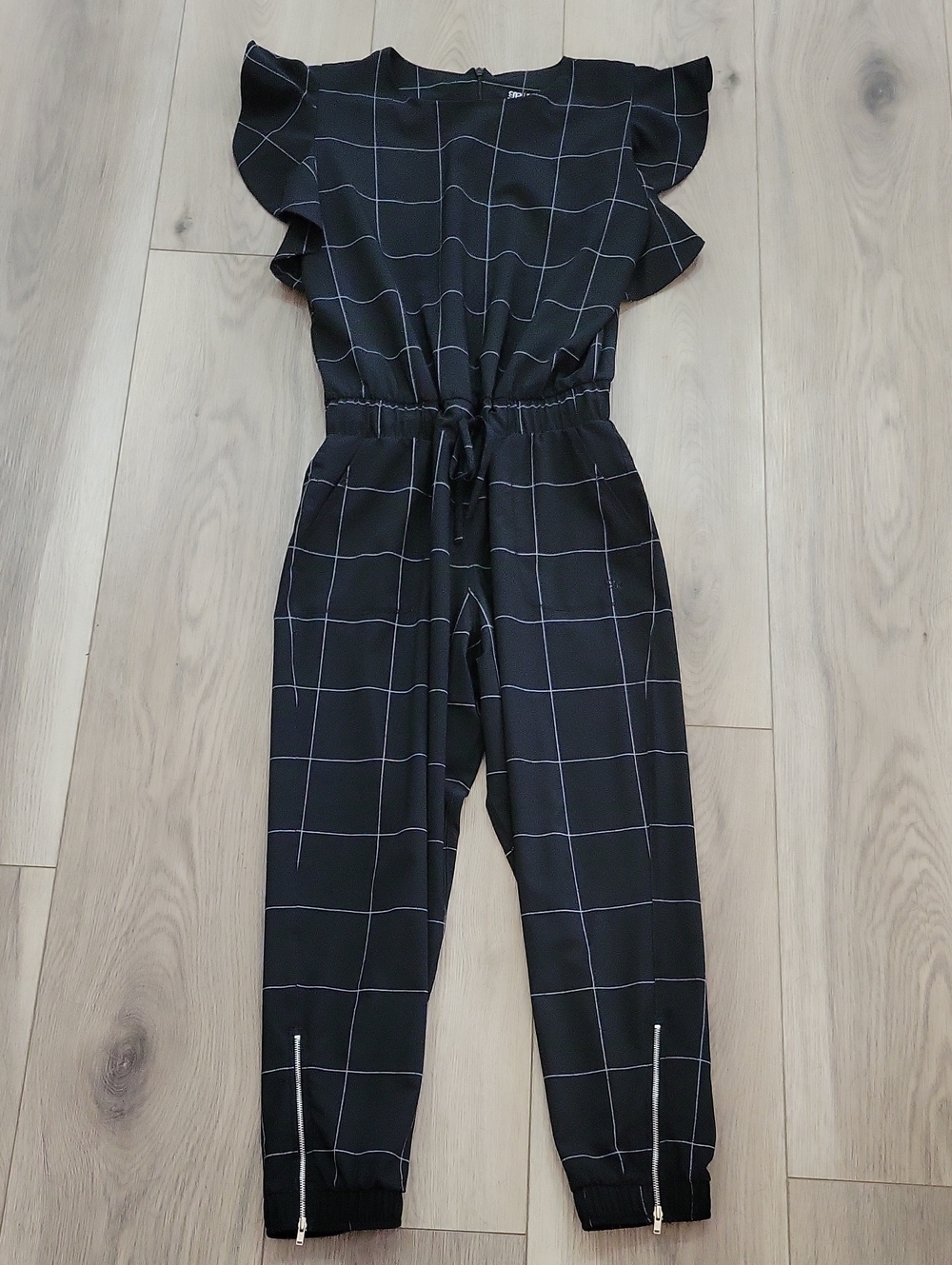 Albion Black Windowpane Jumpsuit with Ruffle Sleeves